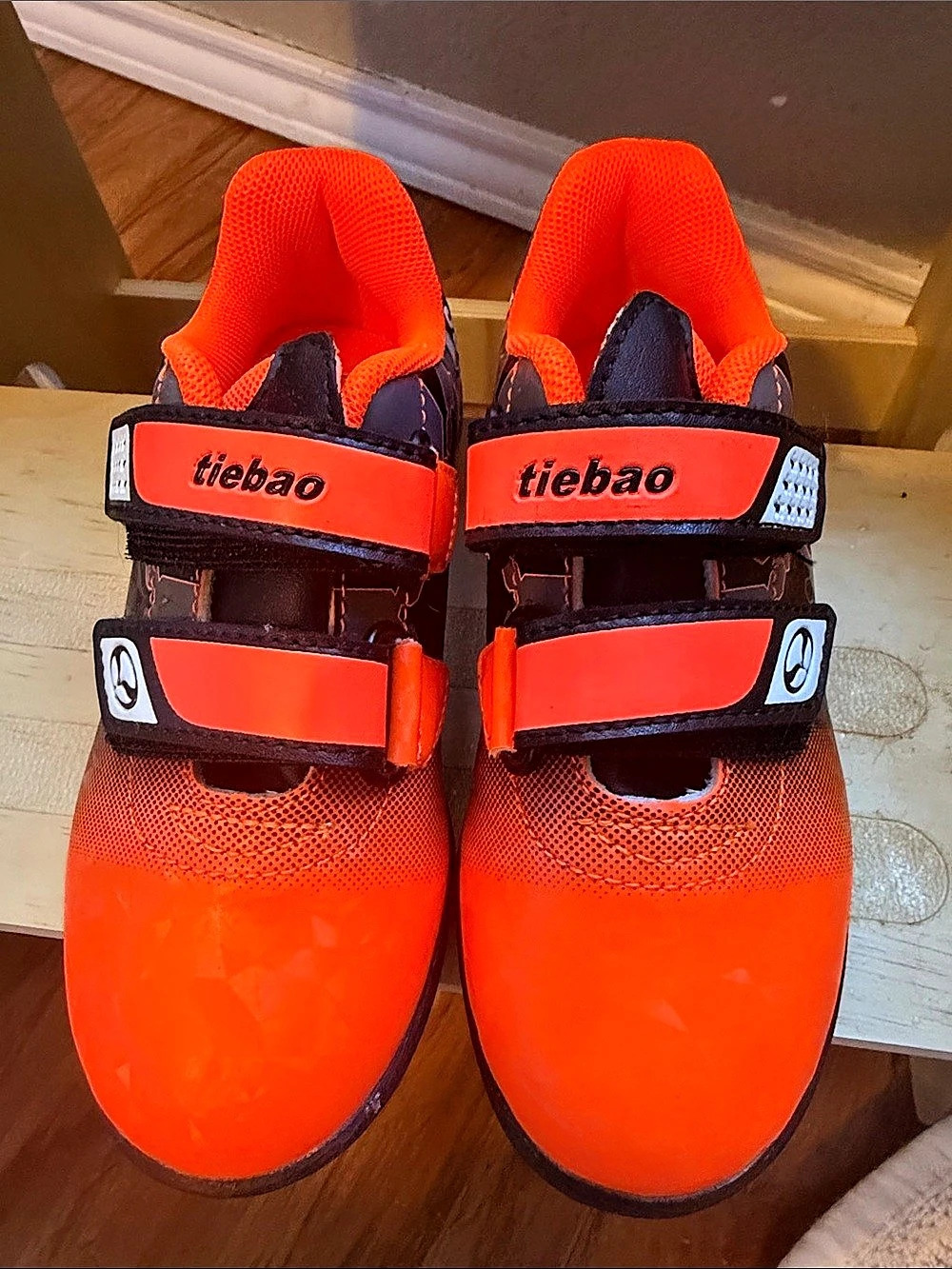 Tiebao Kids Athletic Soccer Shoes in Orange & Black. Brand new / no box